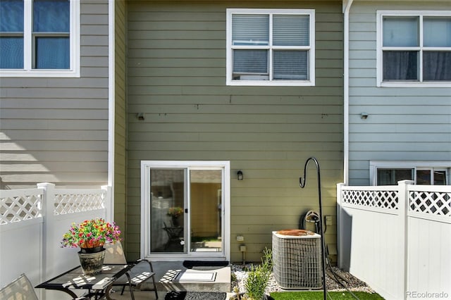 15612 E 96th Way Unit 20B, Commerce City, CO 80022 - rear view of house featuring a fenced backyard and a patio