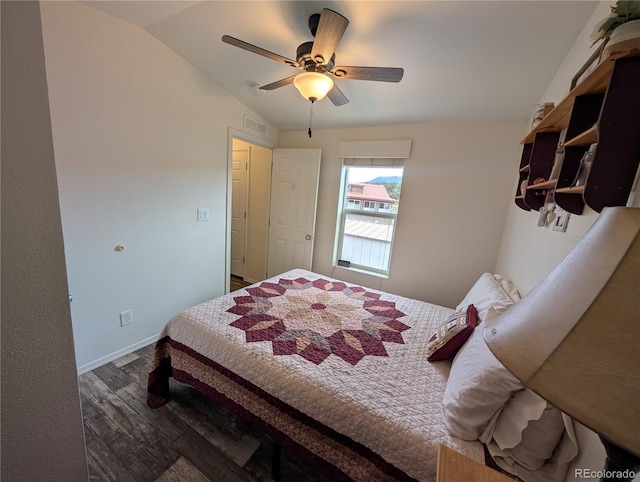 10795 County Road 197a Unit 137, Nathrop, CO 81236 - bedroom featuring dark wood-style flooring, vaulted ceiling, a ceiling fan, and baseboards