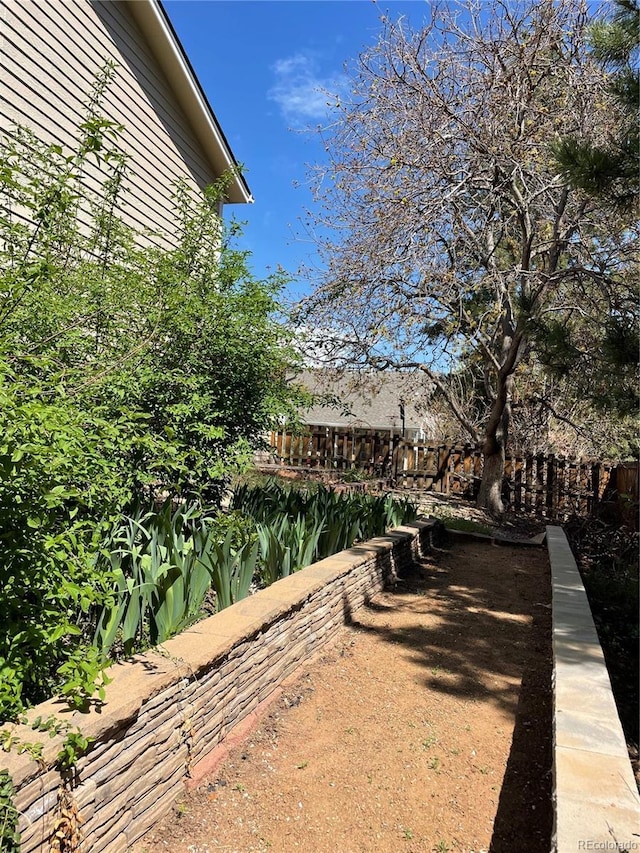 view of yard with fence
