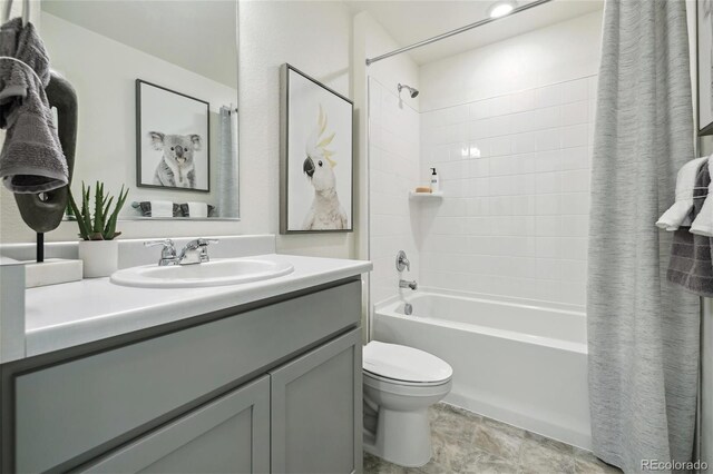 9865 Biscay St, Commerce City, CO 80022 - full bath with toilet, shower / bath combo with shower curtain, and vanity