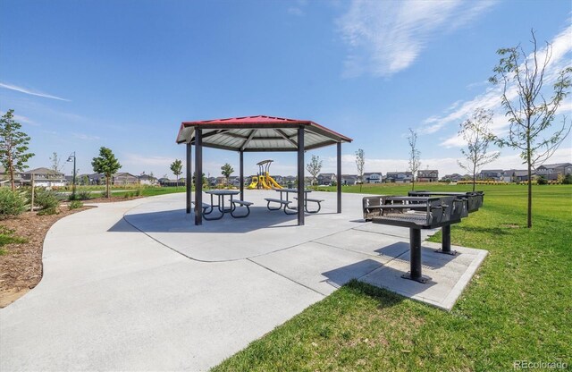 9865 Biscay St, Commerce City, CO 80022 - view of home's community with playground community and a yard