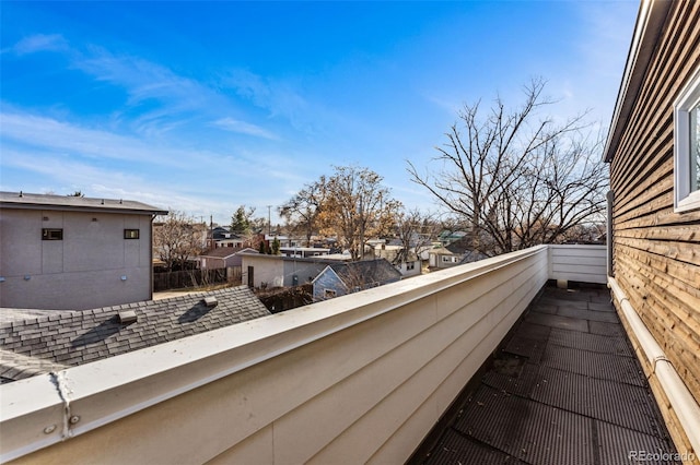 balcony featuring a residential view