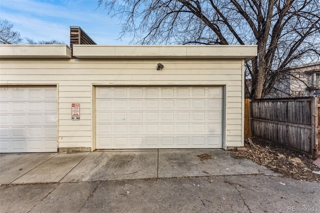 garage featuring fence