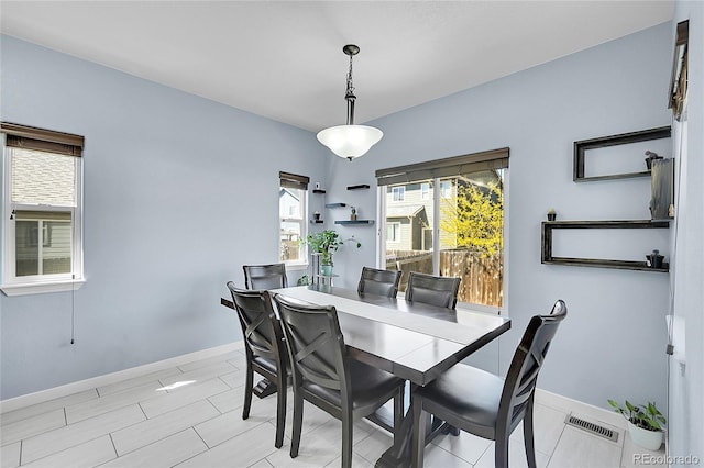 6829 Juniper Ct, Frederick, CO 80530 - dining space featuring baseboards