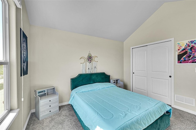 6829 Juniper Ct, Frederick, CO 80530 - carpeted bedroom with lofted ceiling, baseboards, and a closet