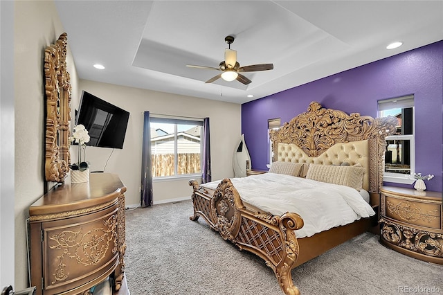 6829 Juniper Ct, Frederick, CO 80530 - bedroom with carpet floors, recessed lighting, a tray ceiling, a ceiling fan, and baseboards