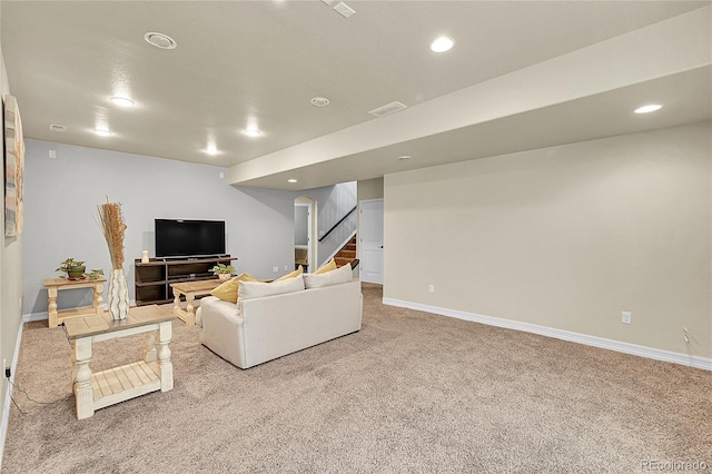 6829 Juniper Ct, Frederick, CO 80530 - carpeted living room featuring stairway, baseboards, and recessed lighting