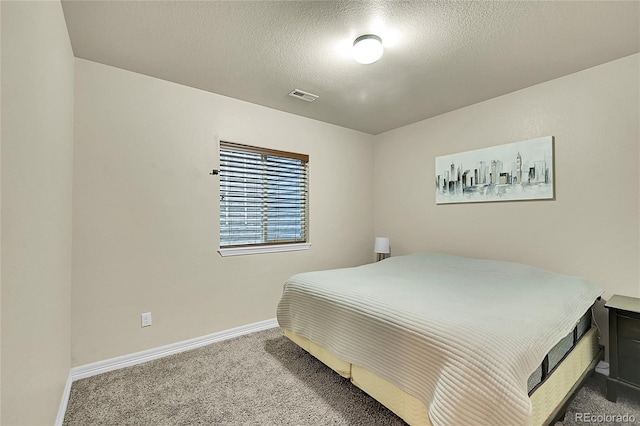 6829 Juniper Ct, Frederick, CO 80530 - carpeted bedroom featuring baseboards and a textured ceiling