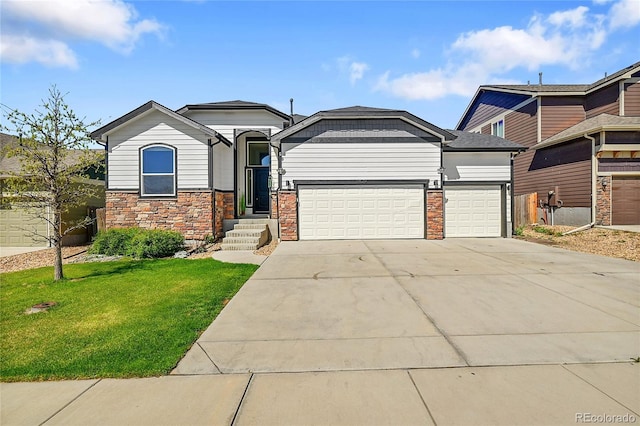 6829 Juniper Ct, Frederick, CO 80530 - view of front of house with a garage, a front yard, concrete driveway, and stone siding
