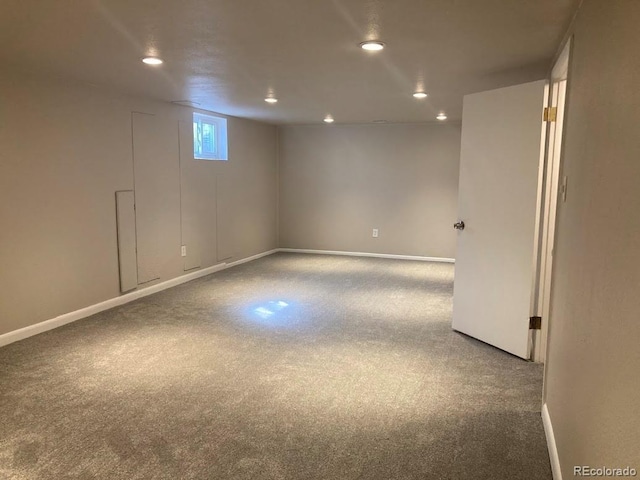 basement featuring recessed lighting, carpet flooring, and baseboards