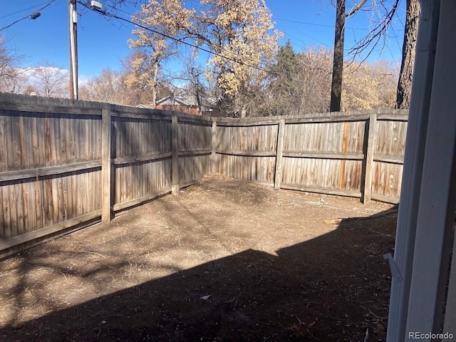 view of yard featuring a fenced backyard