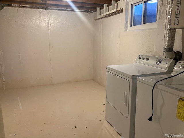 laundry area with laundry area and washing machine and dryer