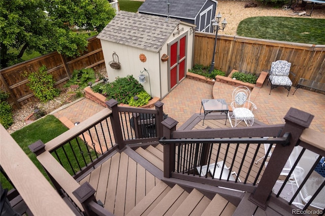 10218 Woodrose Ct, Highlands Ranch, CO 80129 - wooden terrace featuring a fenced backyard and a patio area