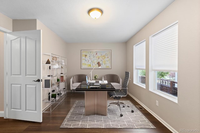 1983 Candleglow St, Castle Rock, CO 80109 - office space featuring dark wood-type flooring, baseboards, and visible vents