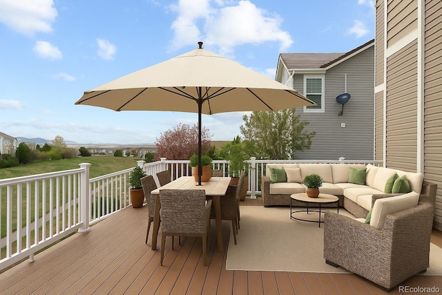 1983 Candleglow St, Castle Rock, CO 80109 - wooden deck with an outdoor living space and outdoor dining space