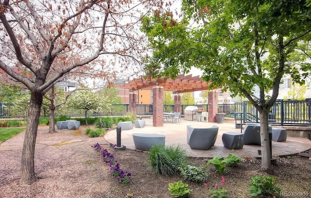 exterior space with a patio, fence, and a pergola