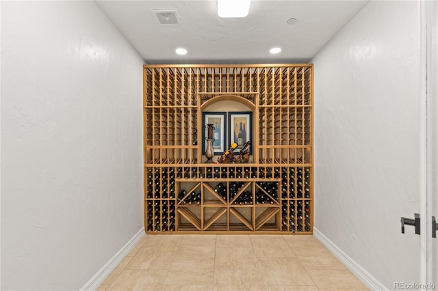 wine cellar with tile patterned floors