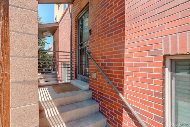 exterior space featuring brick siding