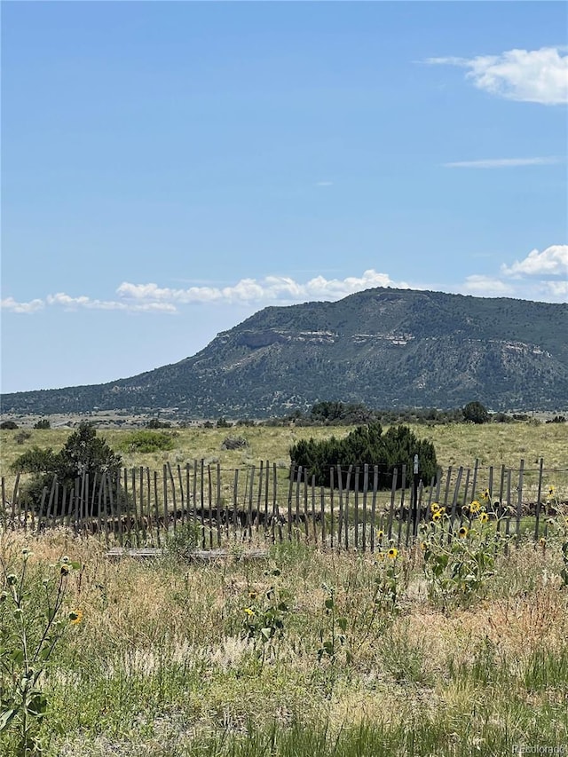 property view of mountains featuring a rural view