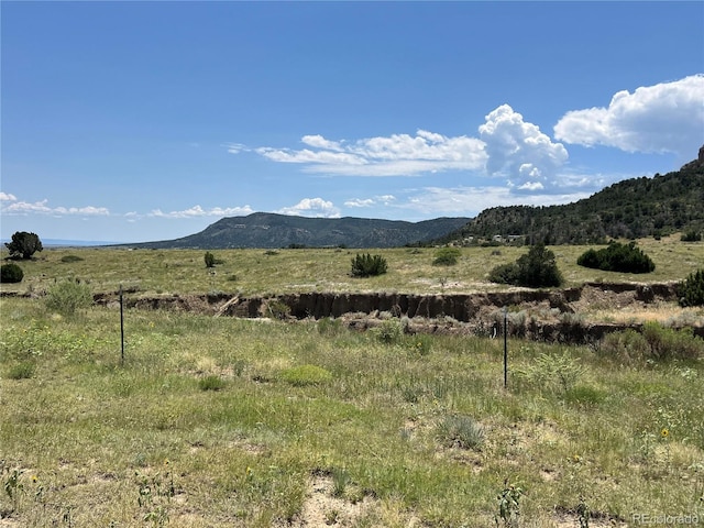 view of mountain feature with a rural view