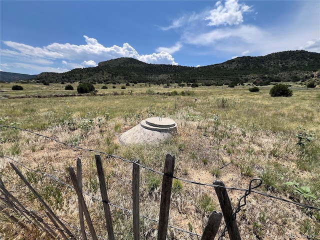 mountain view featuring a rural view