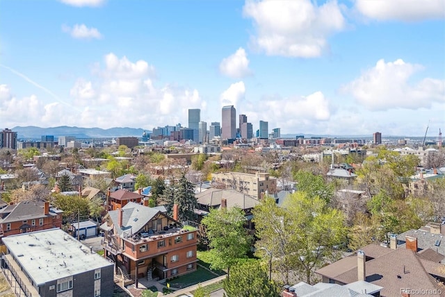 aerial view with a view of city and a mountain view