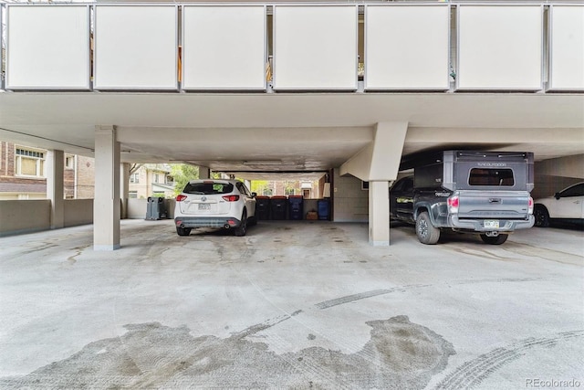view of parking / parking lot featuring a parking deck