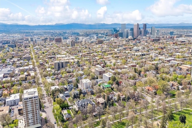 drone / aerial view with a view of city and a mountain view