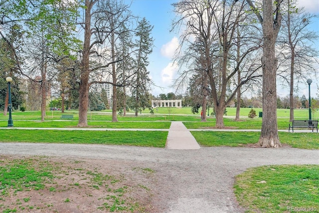 view of home's community featuring a lawn