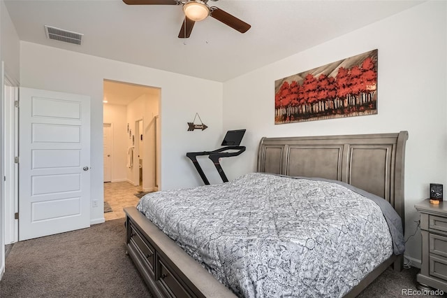 bedroom featuring dark colored carpet, ceiling fan, and baseboards