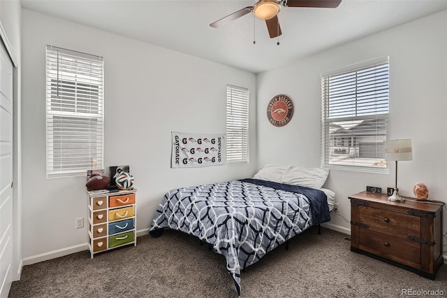 bedroom with carpet, baseboards, a closet, and ceiling fan