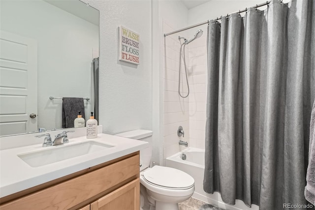 full bath featuring toilet, vanity, and shower / bath combo with shower curtain