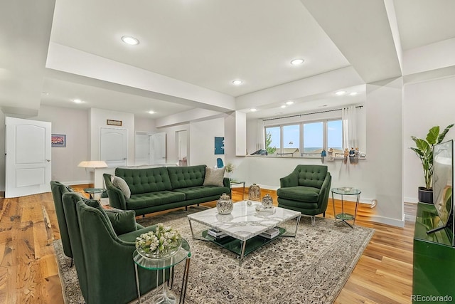 living room with light hardwood / wood-style floors