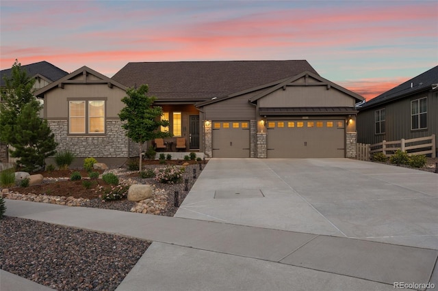 craftsman house with a garage