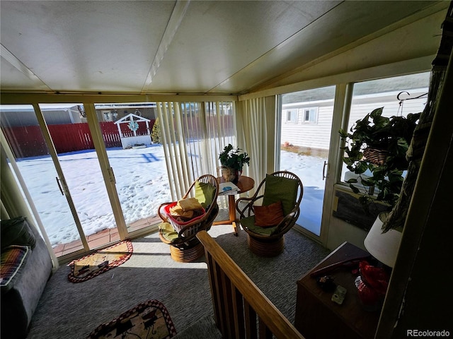 sunroom with lofted ceiling