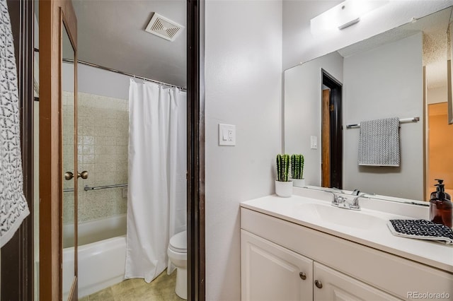 7770 W 38th Ave Unit 207, Wheat Ridge, CO 80033 - full bathroom featuring vanity, shower / tub combo, toilet, and tile patterned flooring