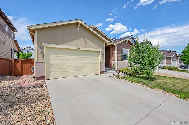675 W 171st Pl, Broomfield, CO 80023 - ranch-style house with an attached garage and driveway