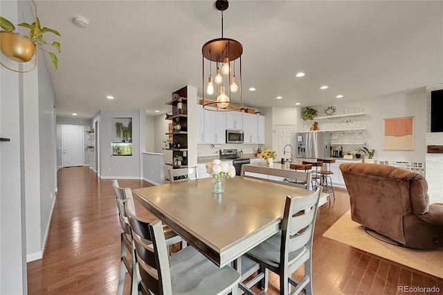 675 W 171st Pl, Broomfield, CO 80023 - dining space featuring hardwood / wood-style flooring and recessed lighting