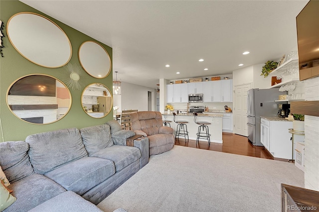 675 W 171st Pl, Broomfield, CO 80023 - living area with recessed lighting and dark wood-type flooring