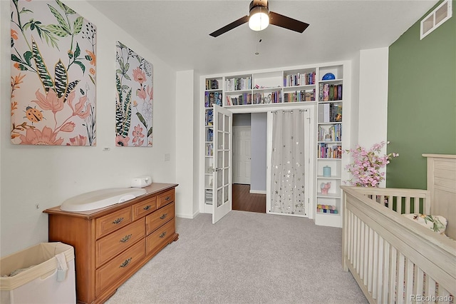 675 W 171st Pl, Broomfield, CO 80023 - bedroom featuring light carpet, french doors, ceiling fan, and a nursery area