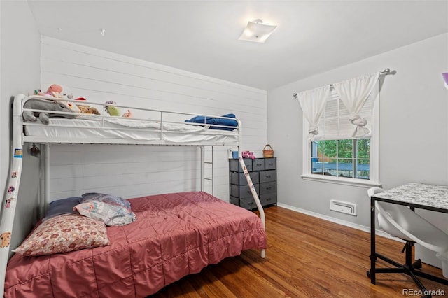 2415 N Logan Ave, Colorado Springs, CO 80907 - bedroom with wood finished floors and baseboards