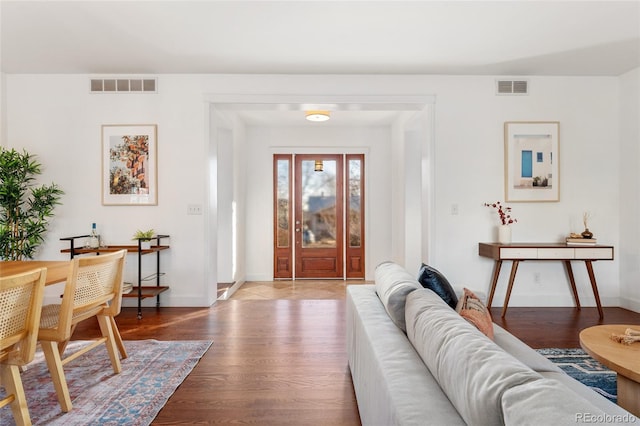 foyer entrance featuring wood-type flooring