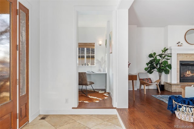 entrance foyer with light tile patterned floors