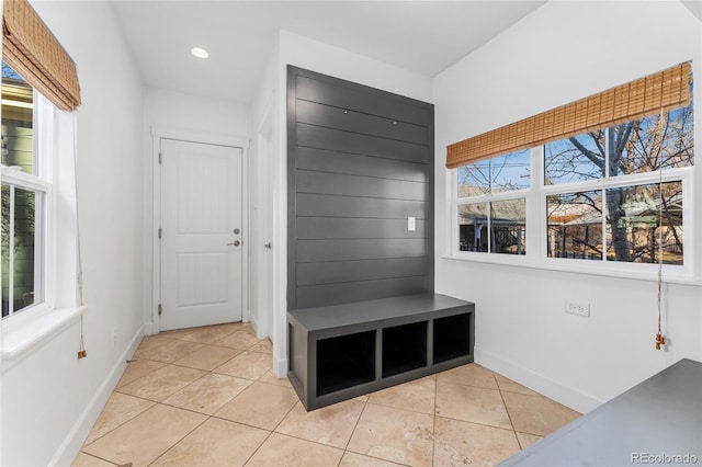 mudroom featuring light tile patterned floors