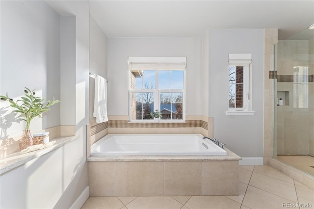 bathroom with tile patterned flooring and plus walk in shower