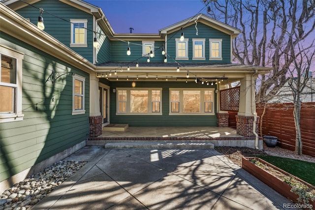 back of house with a patio area