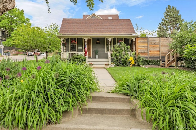 503 15th St, Golden, CO 80401 - view of front facade featuring covered porch, a shingled roof, and stairs