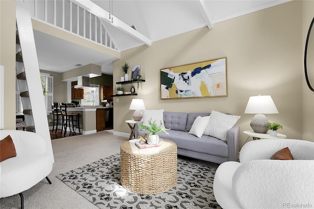 503 15th St, Golden, CO 80401 - carpeted living room featuring high vaulted ceiling, beam ceiling, and baseboards