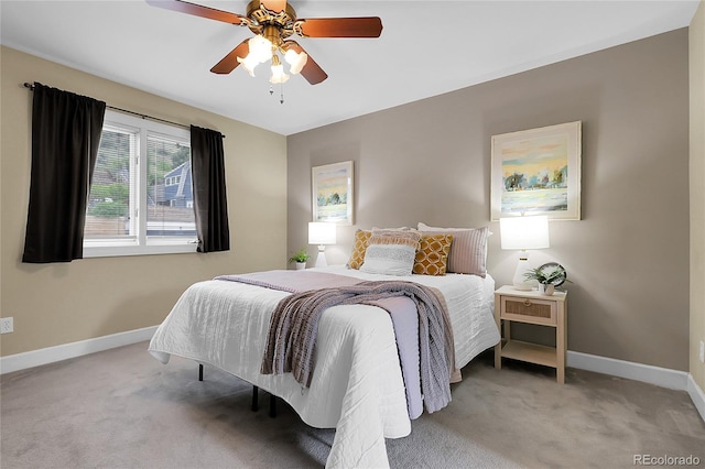 503 15th St, Golden, CO 80401 - bedroom featuring light carpet, baseboards, and ceiling fan