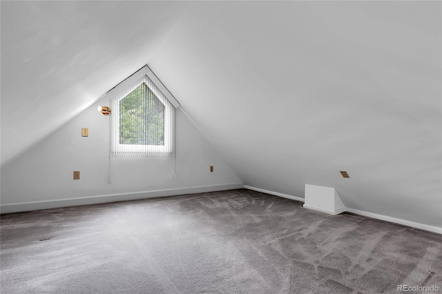 503 15th St, Golden, CO 80401 - bonus room featuring carpet floors, vaulted ceiling, and baseboards